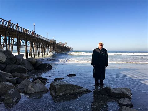 trench coat guy oceanside.